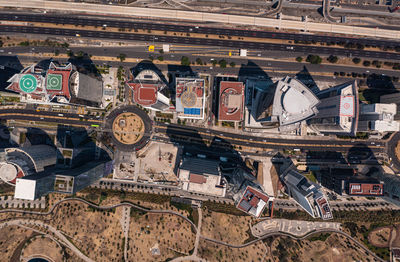High angle view of railroad tracks and buildings in city