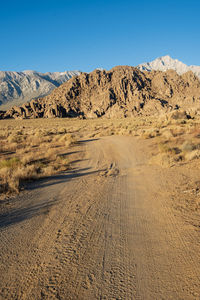 Scenic view of desert against clear sky