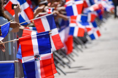 High angle view of dominican flags at the dominican day parade in new york city.