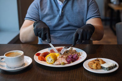 High angle view of breakfast served on table