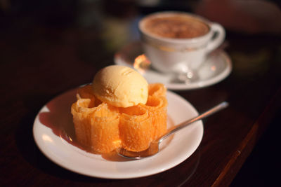 Close-up of dessert served on table