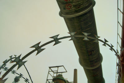 Low angle view of bell tower against clear sky