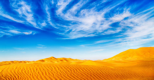 Scenic view of desert against sky