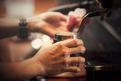 Close-up of man preparing food