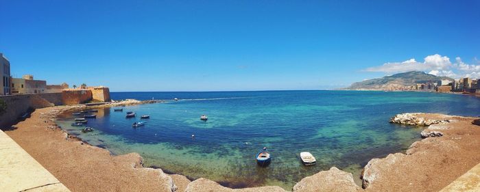 High angle view of beach against blue sky