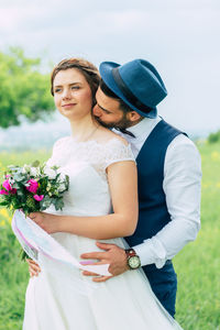 Young couple holding hands