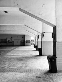 Empty parking lot by building