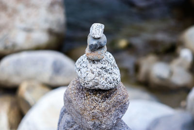 Close-up of stone stack on rock