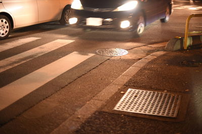 Cars on road at night