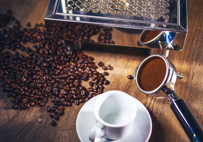 High angle view of coffee cup on table