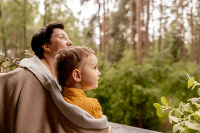 Happy grandmother and grandson enjoy time together. positive middle age woman