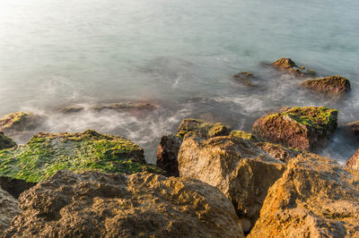 Scenic view of rocks in sea