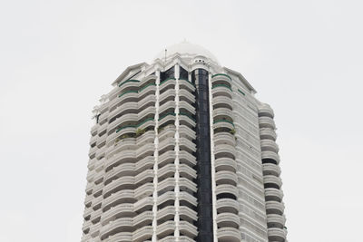 Low angle view of modern building against clear sky