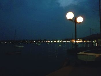 Illuminated street lights at night