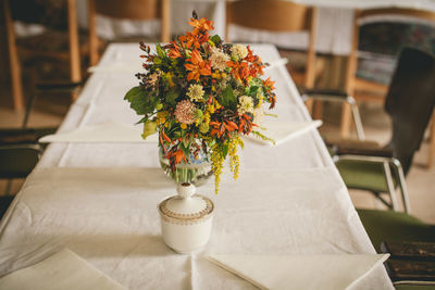 Flowers in vase on table