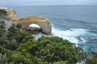 Scenic view of sea against mountain