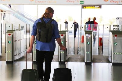 Full length of man walking in airport