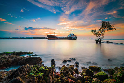 Scenic view of sea against sky during sunset