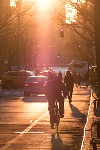 People walking on road in city