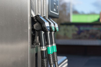 Close-up of petrol pump at gas station