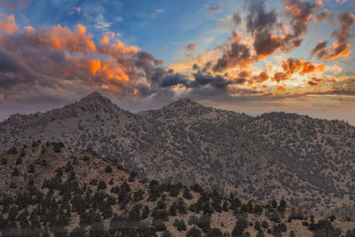 Scenic view of mountains against sky during sunset