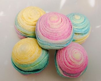 High angle view of multi colored candies on table