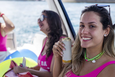 Women on a boat in a bikini. 