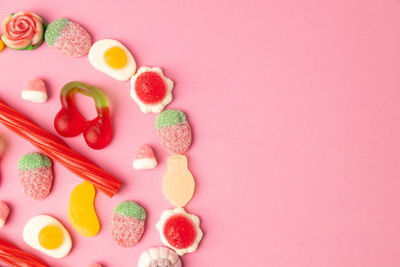 High angle view of multi colored candies on table