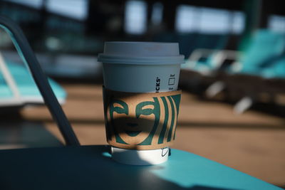 Close-up of coffee cup on table