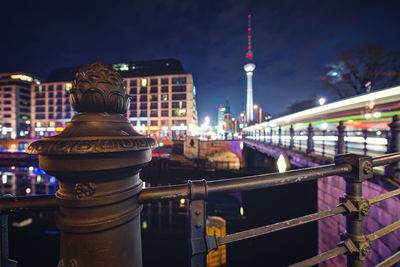 View of city lit up at night