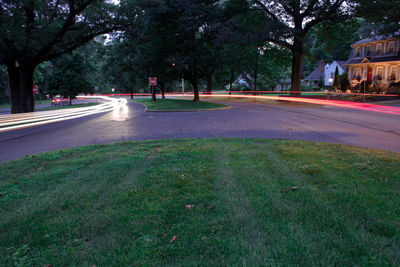 Light trails on street in city at night