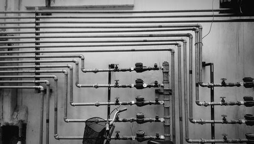 Water pipes against wall