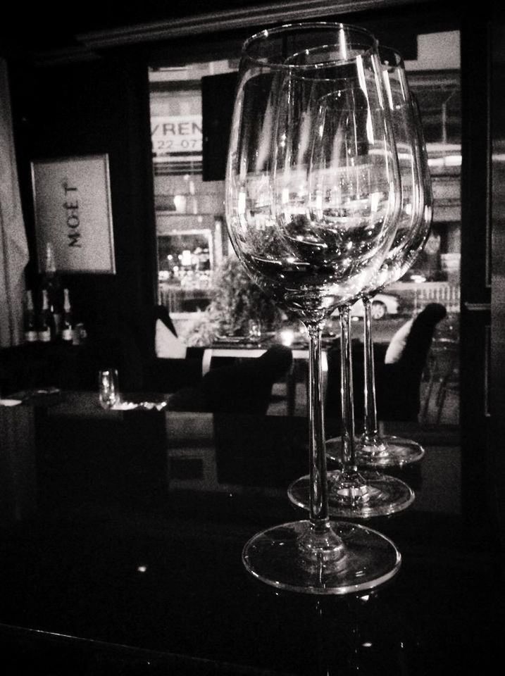 indoors, wineglass, table, glass - material, drinking glass, transparent, drink, food and drink, still life, refreshment, wine, alcohol, glass, close-up, wine glass, restaurant, focus on foreground, red wine, bottle, no people