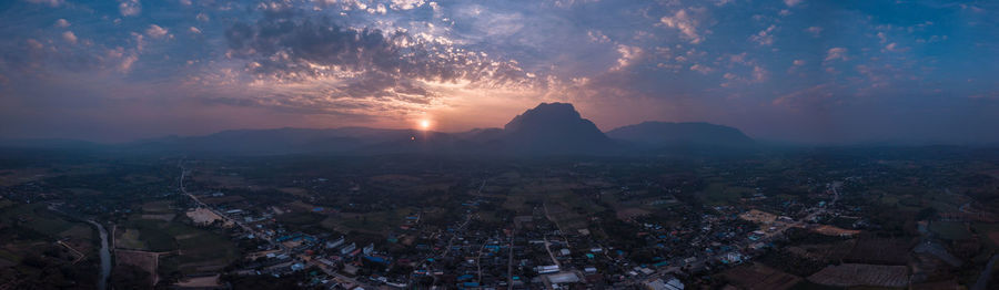 High angle view of townscape against sky at sunset