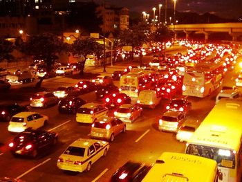 View of traffic on road at night