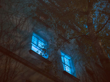 Low angle view of building against sky at night