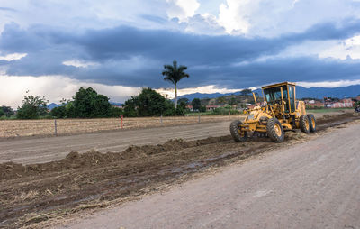 View of construction site on road against sky