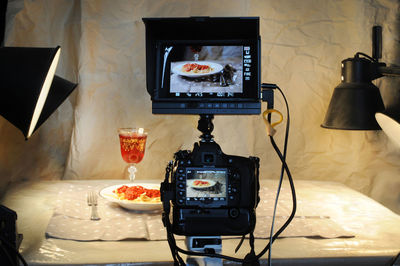 Close-up of telephone booth on table