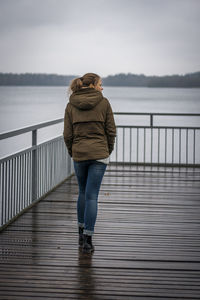 Rear view of woman on beach