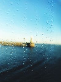 Full frame shot of wet window in rainy season