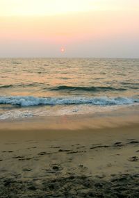 Scenic view of sea at sunset