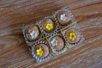 Pastry snack with a sugar topping resembling a flower.