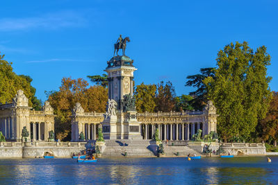 The monument to king alfonso xii is located in buen retiro park, madrid, spain.