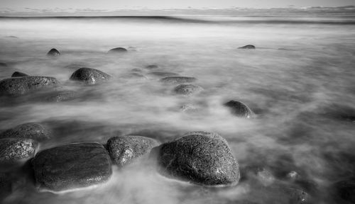 View of rocks in sea