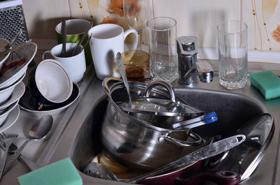 Close-up of kitchen utensil in sink at home