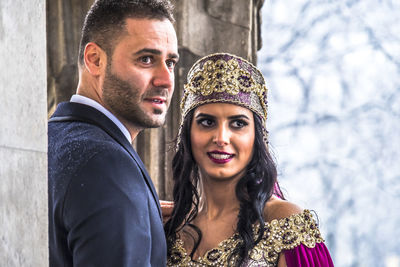 Bride with bridegroom during weeding ceremony