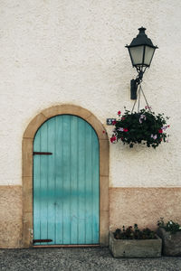 Street light on wall of building