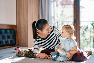 Mother and daughter at home