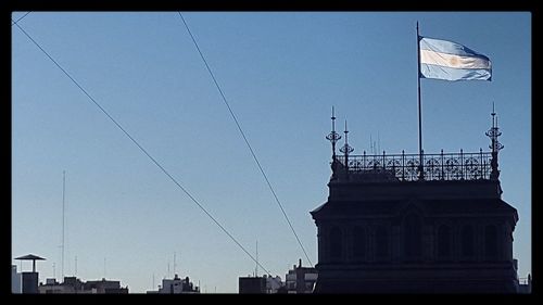 Low angle view of buildings against clear sky