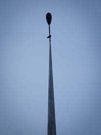 Low angle view of built structure against blue sky